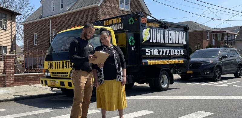 Happy customer paying for junk removal in Bronx NY
